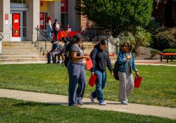 Photo of students walking outside of George H Talbott hall during Welcome Week.